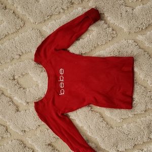 Red, really soft sweater from Bebe (80% rayon and 20% spandex)
